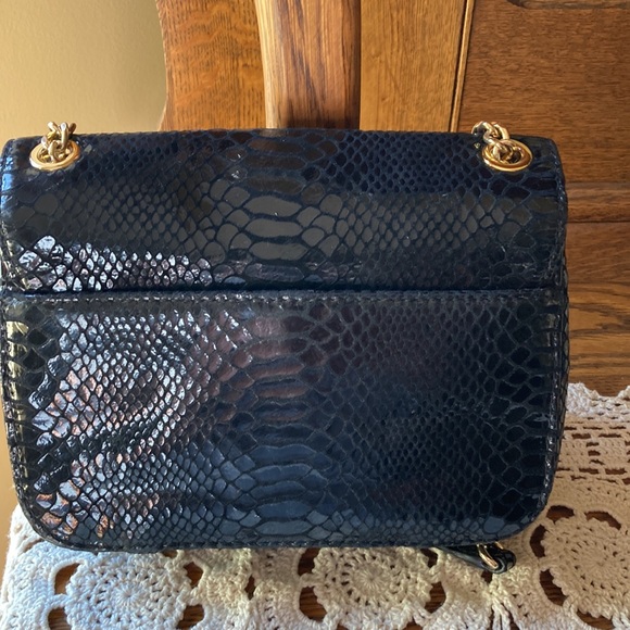 Michael Kors woman’s black embossed over the shoulder purse NWOT. Gold hardware. - Picture 4 of 7